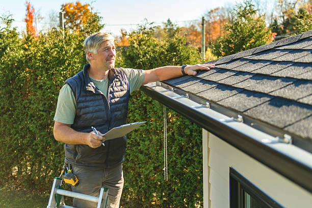 Professional Roofing technician working in Niagara, ND